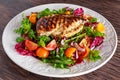 Grilled Chicken Breast fillet with fresh tomatoes vegetables salad. concept healthy food. Royalty Free Stock Photo