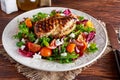 Grilled Chicken Breast fillet with fresh tomatoes vegetables salad. concept healthy food. Royalty Free Stock Photo