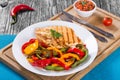 Grilled Chicken breast fillet and fried bell pepper , close-up Royalty Free Stock Photo