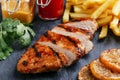 Grilled chicken breast with french fries Royalty Free Stock Photo