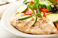 Grilled chicken breast with green and red pepper, cherry tomatoes, lettuce, black olives, cucumber, pink pepper and fresh rosemary Royalty Free Stock Photo