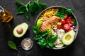 Grilled chicken breast lunch bowl with fresh tomato, avocado, corn, red onion, rice and basil Royalty Free Stock Photo