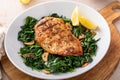 Grilled chicken breast with sauteed garlic spinach, healthy lunch idea