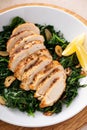 Grilled chicken breast with sauteed garlic spinach, healthy lunch idea