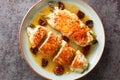 Grilled chicken breast stuffed with mozzarella, asparagus and tomatoes close-up in a plate. Horizontal top view Royalty Free Stock Photo