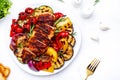 Grilled chicken breast and various vegetables. Colorful paprika, zucchini, eggplant, mushrooms, tomatoes, onion with rosemary on Royalty Free Stock Photo