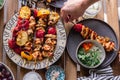 Grilled chicken breast and vegetables skewers. Barbeque summer time. Party dinner. Table setting. Bright and vibrant colors.