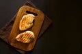 Grilled chicken breasts with spices on wooden desk Royalty Free Stock Photo