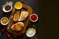Grilled chicken breasts with spices on wooden desk Royalty Free Stock Photo