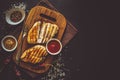 Grilled chicken breasts with spices on wooden desk Royalty Free Stock Photo