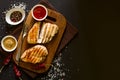 Grilled chicken breasts with spices on wooden desk Royalty Free Stock Photo