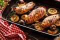 Grilled chicken breasts with thyme, garlic and lemon slices on a grill pan Royalty Free Stock Photo