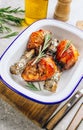 Grilled chicken drumstick bbq with rosemary on a stone gray background Royalty Free Stock Photo