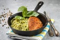 Grilled chicken fillet with spices and spaghetti with pesto Royalty Free Stock Photo