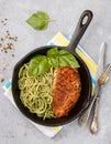 Grilled chicken fillet with spices and spaghetti with pesto Royalty Free Stock Photo