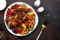 Grilled chicken fillet and vegetables salad. Colorful paprika, zucchini, eggplant, mushrooms, tomatoes, red onion with rosemary, Royalty Free Stock Photo