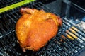 Grilled chicken in the flaming grill