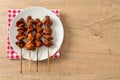 Grilled chicken gizzard skewer yakitori serve in izakaya style Royalty Free Stock Photo