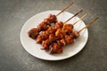 Grilled chicken gizzard skewer yakitori serve in izakaya style Royalty Free Stock Photo