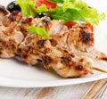 Grilled chicken kebab on a white plate Royalty Free Stock Photo