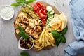 Grilled chicken kebabs platter with vegetables Royalty Free Stock Photo