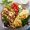Grilled chicken kebabs platter with vegetables Royalty Free Stock Photo