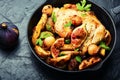 Chicken baked with potatoes and figs Royalty Free Stock Photo