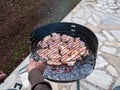 Grilled chicken legs on the flaming barbeque grill Royalty Free Stock Photo
