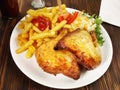 Fine Meat - Grilled Chicken Legs with French Fries and Coleslaw Salad Royalty Free Stock Photo