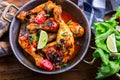Grilled chicken legs, lettuce and cherry tomatoes limet olives. Traditional cuisine. Mediterranean cuisine Royalty Free Stock Photo