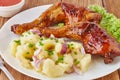 Grilled chicken legs with potato salad, vegetables and tomato sauce Royalty Free Stock Photo