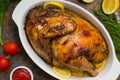 Grilled chicken marinated in balsamic sauce, spicy Italian herbs and fresh lemon. Restaurant supply on a wooden table Royalty Free Stock Photo