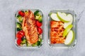 Grilled chicken meal prep containers with rice, broccoli and tomatoes and dessert pie with green apple Royalty Free Stock Photo