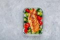 Grilled chicken meal prep containers with rice, broccoli and tomatoes Royalty Free Stock Photo