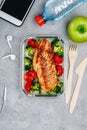 Grilled chicken meal prep containers with rice, broccoli and tomatoes Royalty Free Stock Photo