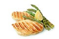 Grilled chicken meat, asparagus, rosemary and lemon isolated on white background Royalty Free Stock Photo