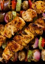 Grilled chicken meat on skewer