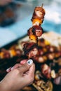 Grilled chicken meat skewers rolled with bacon. barbecue skewers with vegetables and roasted pizza bread Royalty Free Stock Photo