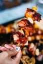Grilled chicken meat skewers rolled with bacon. barbecue skewers with vegetables and roasted pizza bread Royalty Free Stock Photo