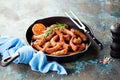 Grilled chicken necks in a cast iron skillet