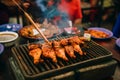 Grilled chicken and pork in local restaurant in Vang Vieng