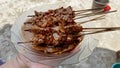 Grilled Chicken Satay with Peanut Sauce and Crispy Fried Onion Toppings