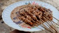 Grilled Chicken Satay with Peanut Sauce and Crispy Fried Onion Toppings