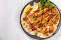 Grilled chicken skewers with flatbreads, top view Royalty Free Stock Photo