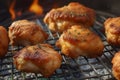 Grilled chicken thighs and vegetables on a grill pan close-up. horizontal top view. Royalty Free Stock Photo