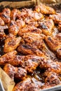 Grilled chicken wings in barbecue sauce in baking tray Royalty Free Stock Photo