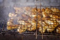 Grilled chicken wings on a grill net