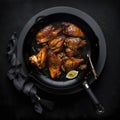 Grilled chicken wings in iron frying pan. Flat lay, top view, central composition on dark, black background. Low key, AI