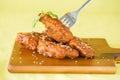 Grilled Chicken Wings with Red Spicy Sauce Royalty Free Stock Photo