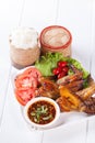 Grilled Chicken Wings with Red Spicy Sauce and Sticky Rice Royalty Free Stock Photo